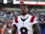 New England Patriots wide receiver Stefon Diggs (8) leaves the field following the game against the Cincinnati Bengals New England Patriots wide receiver Stefon Diggs (8) leaves the field following the game against the Cincinnati Bengals