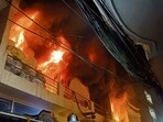The blaze that erupted on Monday night was doused by Tuesday morning. Fire officials say the reason behind he inferno is being looked into. (Gurpreet Singh/HT) The blaze that erupted on Monday night was doused by Tuesday morning. Fire officials say the reason behind he inferno is being looked into. (Gurpreet Singh/HT)