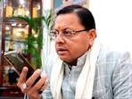 Uttarakhand chief minister Pushkar Singh Dhami speaks on the phone with the father of the Anjel Chakma, a Tripura student who allegedly died following a racist attack in Dehradun (@pushkardhami)