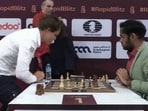 Magnus Carlsen's reaction after losing to Arjun Erigaisi