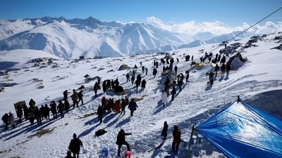 Tourists gather at Afarwat Peak, the upper reaches of Gulmarg, one of the main tourist attractions in Kashmir region. (REUTERS)