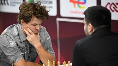 Magnus Carlsen of Norway in action against Rudik Makarian of Russia during the FIDE World Rapid and Blitz Championships. (AFP) Magnus Carlsen of Norway in action against Rudik Makarian of Russia during the FIDE World Rapid and Blitz Championships. (AFP)