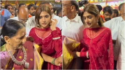 Sreeleela held her grandmother close as they tried to get through the crowd at Tirupati. Sreeleela held her grandmother close as they tried to get through the crowd at Tirupati.