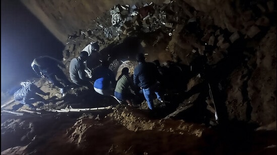 Fire and civil defence teams reached within minutes, dug through debris for 20 minutes and completed rescue by night, officials said. (HT)
