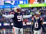 New England Patriots defensive tackle Christian Barmore (90) reacts during the fourth quarter against the Cleveland Browns