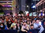People react during countdown for the New Year at Central in Hong Kong, China December 31, 2025. REUTERS/Lam Yik