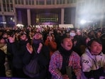 People react after a countdown celebrating the New Year in front of the Tokyo Metropolitan Government building in Tokyo, Japan January 1, 2026.