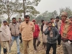 Official and villagers at Magrauli village. (HT) Official and villagers at Magrauli village. (HT)