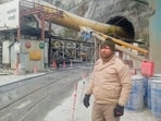 Chamoli: Security personnel at the site after a loco train collided with a goods train on Tuesday night inside Pipalkoti tunnel of the Vishnugad-Pipalkoti Hydro Electric Project tunnel in Gopeshwar area, Chamoli district, Wednesday,