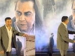 Sunny Deol posing with Dharmendra's poster at Ikkis screening. Sunny Deol posing with Dharmendra's poster at Ikkis screening.
