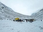 Tourists on the Zanskar-Samdo road, in Lahaul-Spiti, after fresh snowfall on Wednesday. (PTI) Tourists on the Zanskar-Samdo road, in Lahaul-Spiti, after fresh snowfall on Wednesday. (PTI)