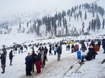 Tourists visit the snow-laden Kongdori on the New Year’s eve, in Gulmarg, on Wednesday. (PTI)