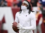 Trevon Diggs #7 looks on prior to a game against the Washington Commanders