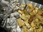 Gold and silver bars are stacked in the safe deposit boxes room of the Pro Aurum gold house in Munich, Germany.