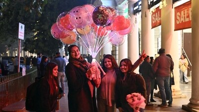 People enjoy themselves at Connaught Place on the eve of New Year, in New Delhi on Wednesday. (ANI Photo/Jitender Gupta) (Jitender Gupta) People enjoy themselves at Connaught Place on the eve of New Year, in New Delhi on Wednesday. (ANI Photo/Jitender Gupta) (Jitender Gupta)