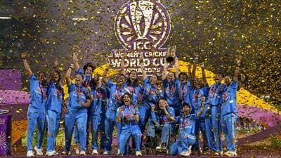 Indian players celebrate with the trophy after winning the ICC Women's World Cup 2025, at the DY Patil Stadium in Navi Mumbai on November 3. (PTI) Indian players celebrate with the trophy after winning the ICC Women's World Cup 2025, at the DY Patil Stadium in Navi Mumbai on November 3. (PTI)
