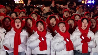 People sing as they gather for a New Year countdown ceremony at the Juyongguan section of the Great Wall, also known as Juyong Pass, in Beijing, China. (REUTERS)