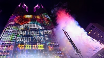 Fireworks explode as projection mapping is displayed on the surface of the Tokyo Metropolitan Government Building to celebrate the New Year, in Tokyo, Japan. (REUTERS)
