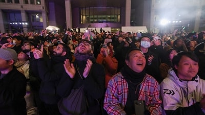 People react after a countdown celebrating the New Year in front of the Tokyo Metropolitan Government building in Tokyo, Japan January 1, 2026. (REUTERS)
