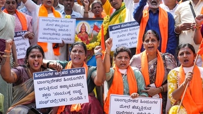 Bengaluru: Members of various Hindu organisations raise slogans during a protest condemning reported incidents of violence against Hindus in Bangladesh. (PTI)