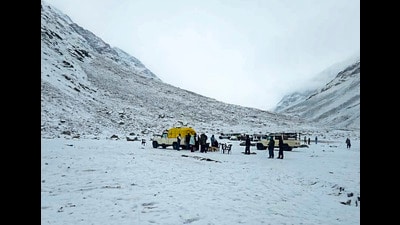 Tourists on the Zanskar-Samdo road, in Lahaul-Spiti, after fresh snowfall on Wednesday. (PTI) Tourists on the Zanskar-Samdo road, in Lahaul-Spiti, after fresh snowfall on Wednesday. (PTI)