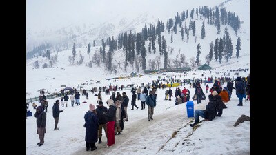 Tourists visit the snow-laden Kongdori on the New Year’s eve, in Gulmarg, on Wednesday. (PTI) Tourists visit the snow-laden Kongdori on the New Year’s eve, in Gulmarg, on Wednesday. (PTI)