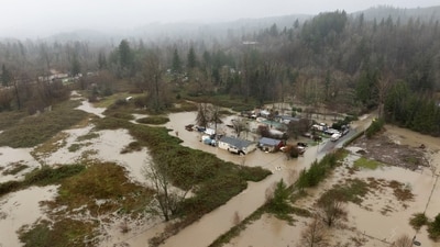 An area flooded by the Wallace River following heavy rainfall in Washington on December 10. (Reuters)