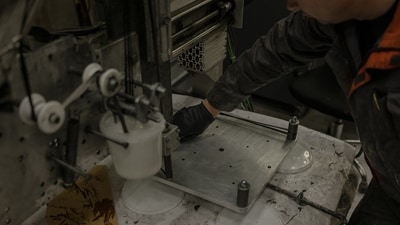 Ukrainian workers make parts for drones. Ukrainian workers make parts for drones.