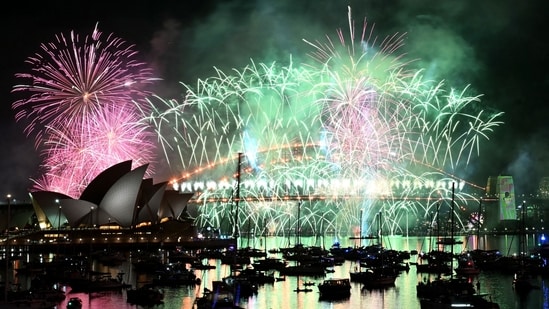 Fireworks light up the midnight sky over Sydney Harbour Bridge and Sydney Opera House during New Year�s Day celebrations in Sydney on January 1, 2026.(AFP)