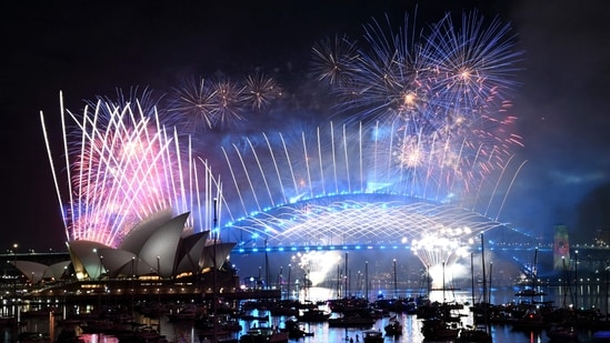 Fireworks light up the midnight sky over Sydney Harbour Bridge and Sydney Opera House during New Year�s Day celebrations in Sydney on January 1, 2026.&nbsp;(AFP)