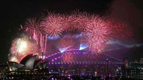 Fireworks light up the midnight sky over Sydney Harbour Bridge and Sydney Opera House during New Year�s Day celebrations in Sydney on January 1, 2026.(AFP)