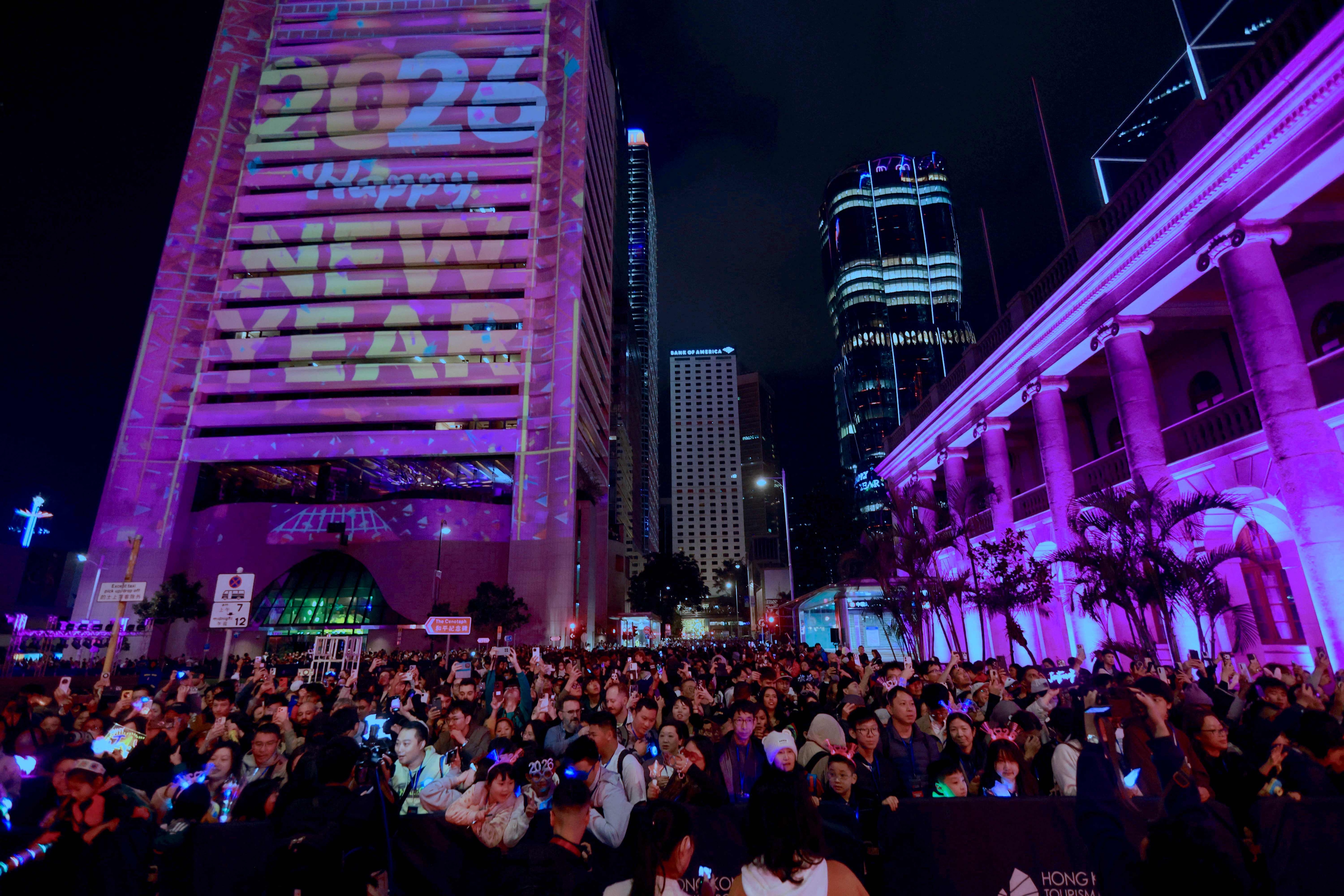 Revellers celebrate the New Year during Hong Kong's countdown celebrations in Central, Hong Kong, on December 31, 2025. (Photo by May JAMES / AFP) (AFP) Revellers celebrate the New Year during Hong Kong's countdown celebrations in Central, Hong Kong, on December 31, 2025. (Photo by May JAMES / AFP) (AFP)