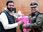 Haryana chief minister Nayab Singh Saini meets newly appointed DGP Ajay Singhal at the state police headquarters in Panchkula on Thursday. (ANI)