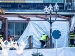 Rescuers and fire-fighters work at the site of an explosion that ripped through a bar in Crans-Montana on January 1, 2026.