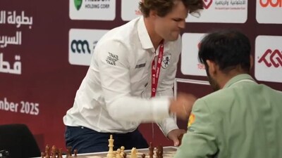 Magnus Carlsen slams the table after running out of time. (X) Magnus Carlsen slams the table after running out of time. (X)