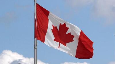 A US and a Canadian flag flutter at the Canada-United States border crossing at the Thousand Islands Bridge. (REUTERS) A US and a Canadian flag flutter at the Canada-United States border crossing at the Thousand Islands Bridge. (REUTERS)