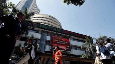 People walk past the Bombay Stock Exchange (BSE) building in Mumbai. (Representative image) (Francis Mascarenhas/Reuters)