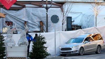 A hearse outside the "Le Constellation" bar, as the rescuers tried to save the injured and retrieve the dead bodies from the bar. According to eyewitnesses near the site of the incident, pyrotechnics may have been the trigger for the massive blaze in the bar. Melko (19), one of the people near the bar, recounted the moments which led up to the tragedy. (REUTERS)