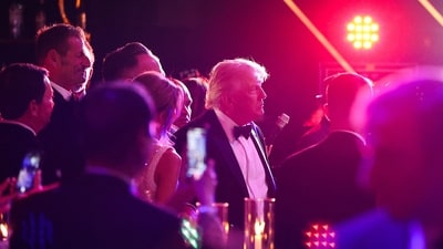 US President Donald Trump mingles with guests during a New Year's Eve event at his Mar-a-Lago home on December 31, 2025 in Palm Beach, Florida. (Getty Images via AFP) US President Donald Trump mingles with guests during a New Year's Eve event at his Mar-a-Lago home on December 31, 2025 in Palm Beach, Florida. (Getty Images via AFP)