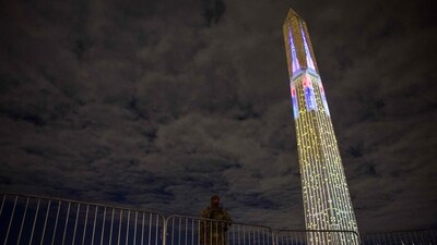 The Washington Monument is illuminated with a projection of US President Donald Trump's "Freedom 250" initiative during the New Year's Eve show at the National Mall in Washington,. (AFP) The Washington Monument is illuminated with a projection of US President Donald Trump's "Freedom 250" initiative during the New Year's Eve show at the National Mall in Washington,. (AFP)