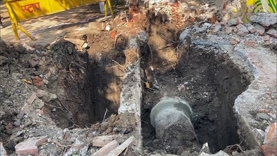 Road dug out in Bhagirathpur area as people suffering from contaminated water increases, in Indore. (ANI Video Grab) Road dug out in Bhagirathpur area as people suffering from contaminated water increases, in Indore. (ANI Video Grab)