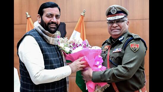 Haryana chief minister Nayab Singh Saini meets newly appointed DGP Ajay Singhal at the state police headquarters in Panchkula on Thursday. (ANI)