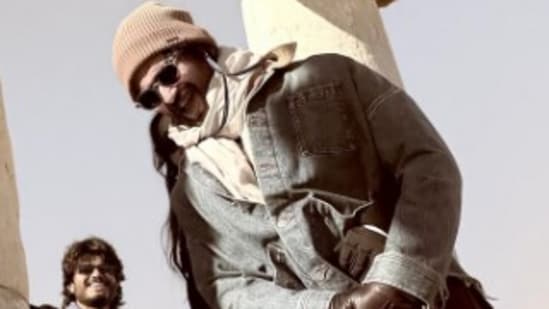 Vijay Deverakonda can't stop giggling as Rashmika Mandanna hugs him.