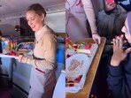 Emirates cabin crew surprised a couple with a mid air wedding anniversary celebration. Emirates cabin crew surprised a couple with a mid air wedding anniversary celebration.