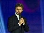Bollywood actor Shah Rukh Khan speaks to the gathering during an event in Mumbai in Nov 2025. 