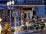 Rescuers are seen at the site of an explosion that ripped through a bar in Crans-Montana on January 1, 2026. 