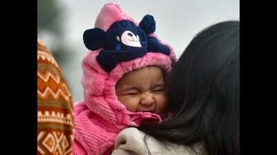 ‘NEED MY BLANKIE’: A baby spotted at the Sukhna Lake amid dipping temperatures in Chandigarh on Friday. (Keshav Singh/HT) ‘NEED MY BLANKIE’: A baby spotted at the Sukhna Lake amid dipping temperatures in Chandigarh on Friday. (Keshav Singh/HT)