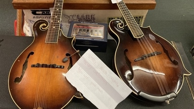 A bizarre theft at a US guitar shop ended unexpectedly when the thief came back days later and returned the stolen mandolins. (Facebook/Lark Street Music) A bizarre theft at a US guitar shop ended unexpectedly when the thief came back days later and returned the stolen mandolins. (Facebook/Lark Street Music)