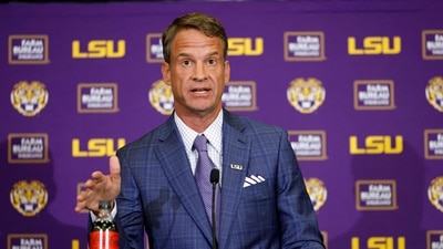 Lane Kiffin speaks at a press conference as he is introduced as the new head football coach of the LSU Tigers (Getty Images via AFP) Lane Kiffin speaks at a press conference as he is introduced as the new head football coach of the LSU Tigers (Getty Images via AFP)
