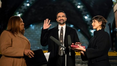 Zohran Mamdani being sworn in as New York mayor on New Year’s Day, wearing a black overcoat and an Eri silk tie Zohran Mamdani being sworn in as New York mayor on New Year’s Day, wearing a black overcoat and an Eri silk tie